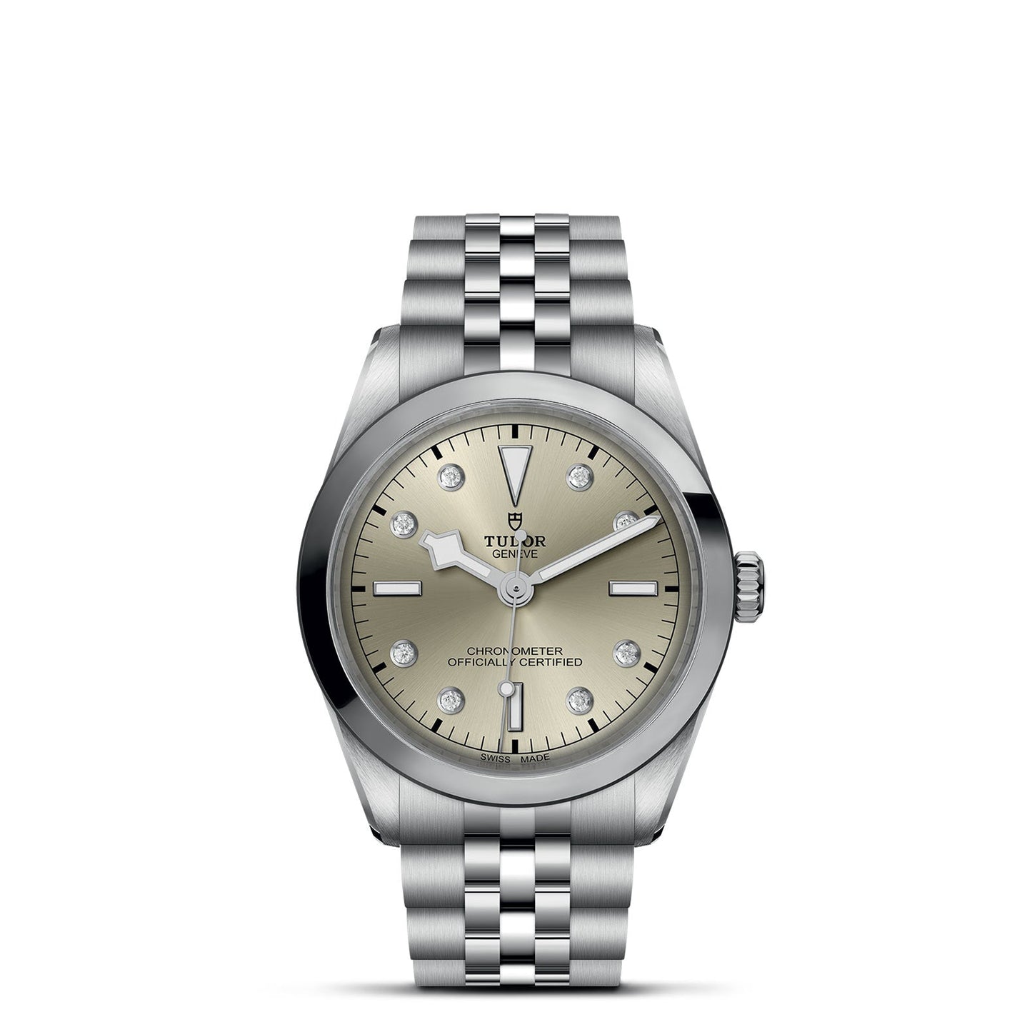 The TUDOR Black Bay One 36 is a silver wristwatch with a polished bezel, metallic bracelet, beige dial, silver hands, "Tudor Geneve" text, and a 36mm steel case that epitomizes the elegance of TUDOR divers' watches.