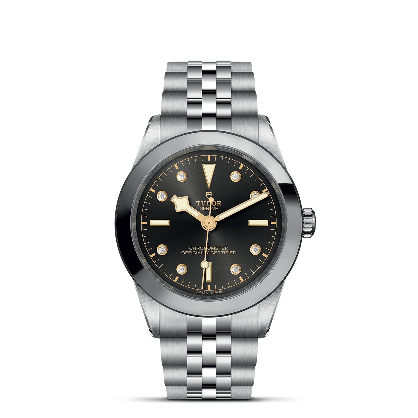 The TUDOR Black Bay One 39 features a silver stainless steel case and bracelet with a black dial and gold accents, reminiscent of the iconic design. Gold hour markers and hands enhance the style, while "TUDOR" is elegantly displayed on the dial, reflecting its diving watch heritage.