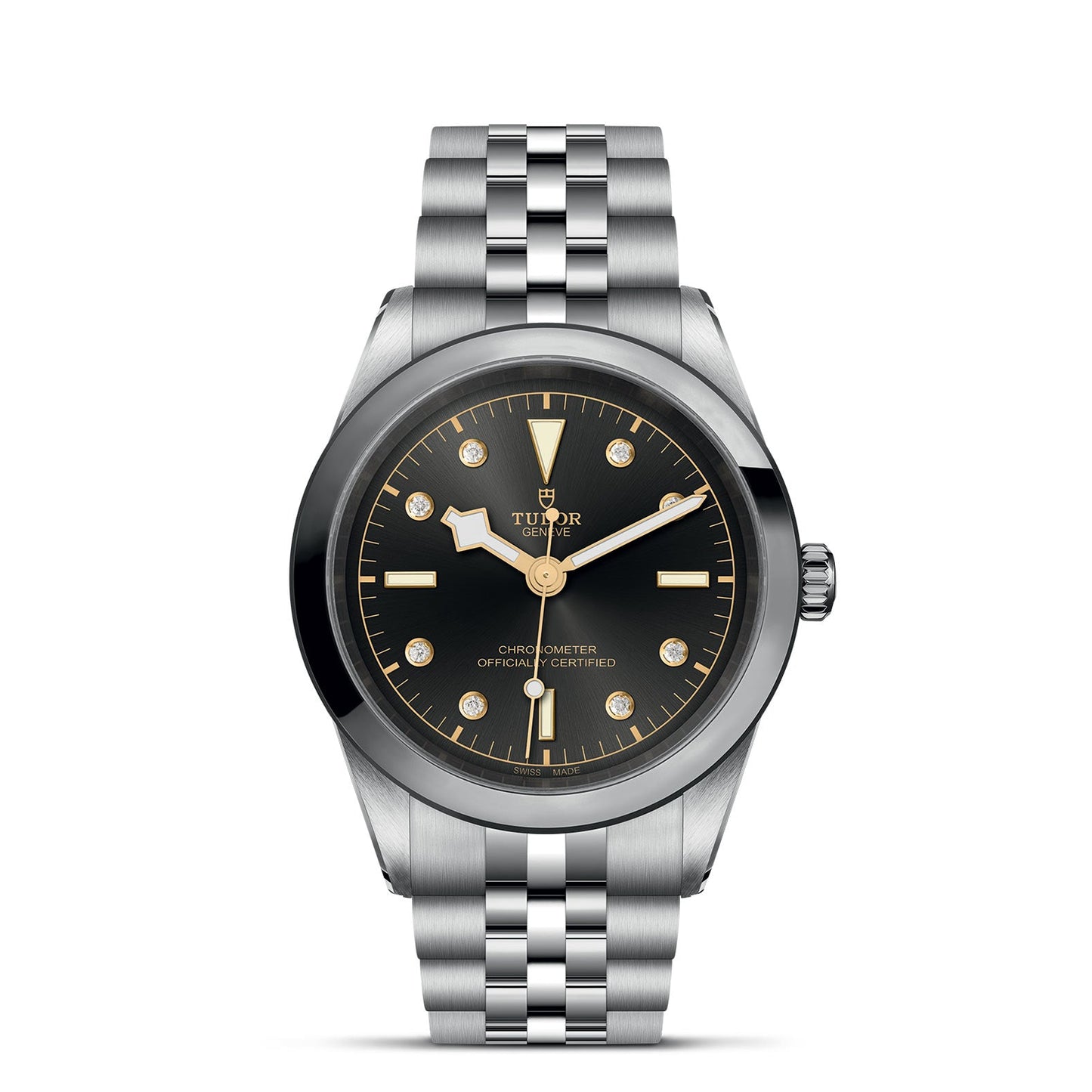 The TUDOR Black Bay One 41 features a 41mm steel case and bracelet, a black dial with gold dot and triangle hour markers, gold hands, a small date display, and the iconic Tudor logo. Inspired by TUDOR divers’ watches, it exudes timeless elegance.