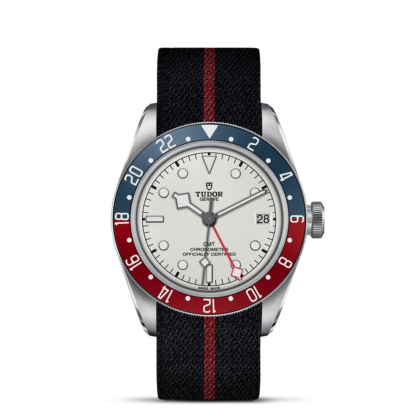 The TUDOR Black Bay GMT wristwatch by TUDOR features an eye-catching red and blue rotatable bezel. It comes with a white dial and a black fabric strap detailed with a red stripe. This timepiece offers multiple time-zone functionality, displaying the date alongside silver hour markers and hands, highlighted by the distinctive red GMT hand.