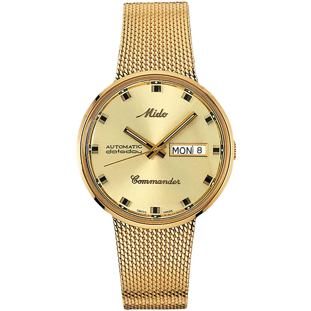 The MIDO Commander 1959 Automatic 37mm features a gold mesh strap, gold dial, black hour markers and hands, plus a day-date window on the right.