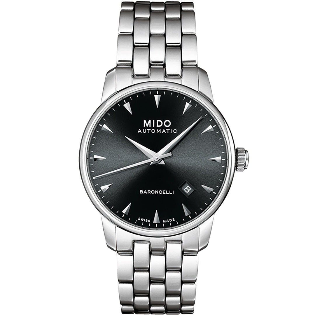 The MIDO Baroncelli II Gent Automatic 38mm Watch features automatic movement, a black dial with silver markers and hands, a date window at 3 o’clock, and a polished metal bracelet.