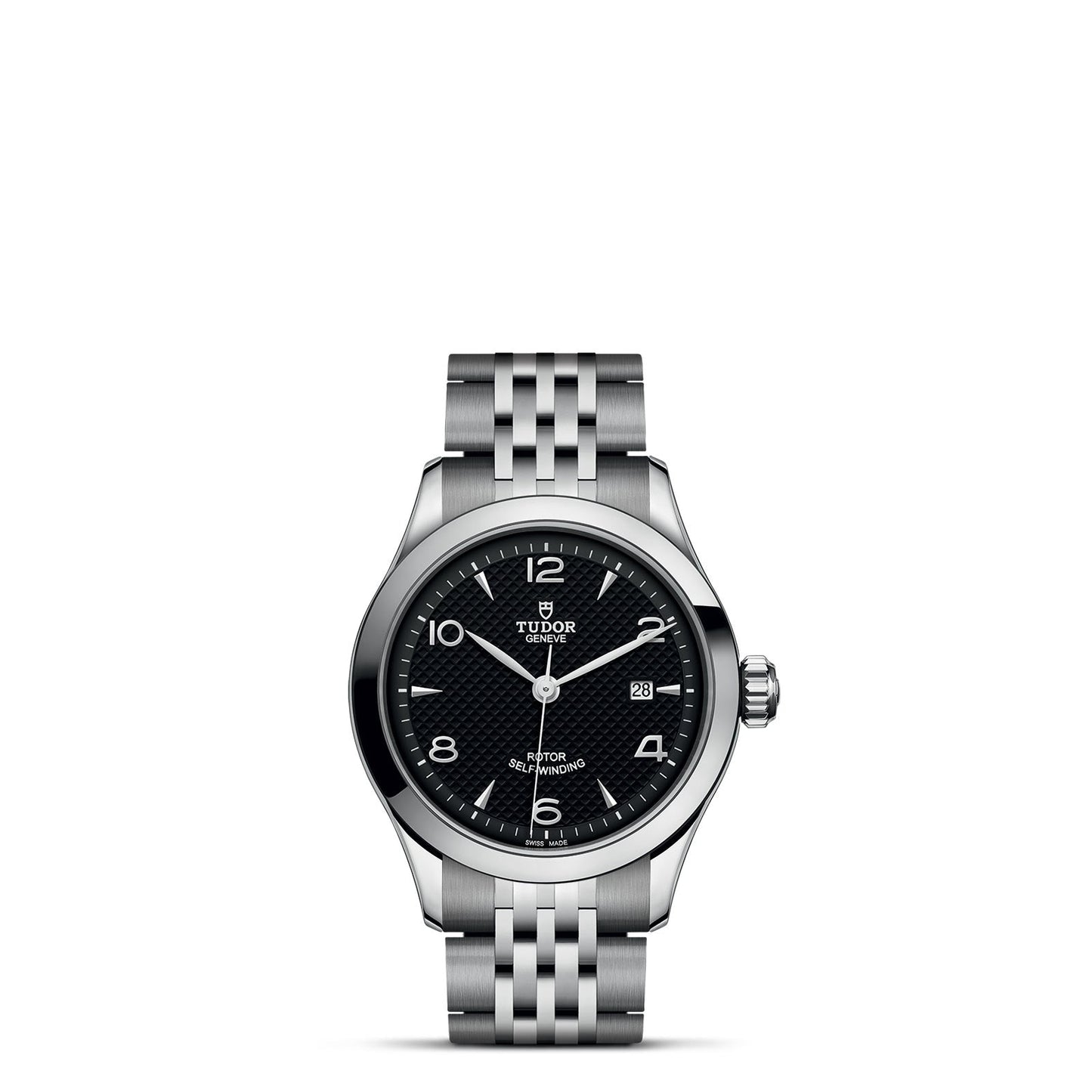 A TUDOR 1926 watch in silver showcases a black textured dial with white numerals and hands, complemented by a date display at the 3 o'clock position. It features a classic and elegant five-link metal bracelet, all presented against a plain white background.