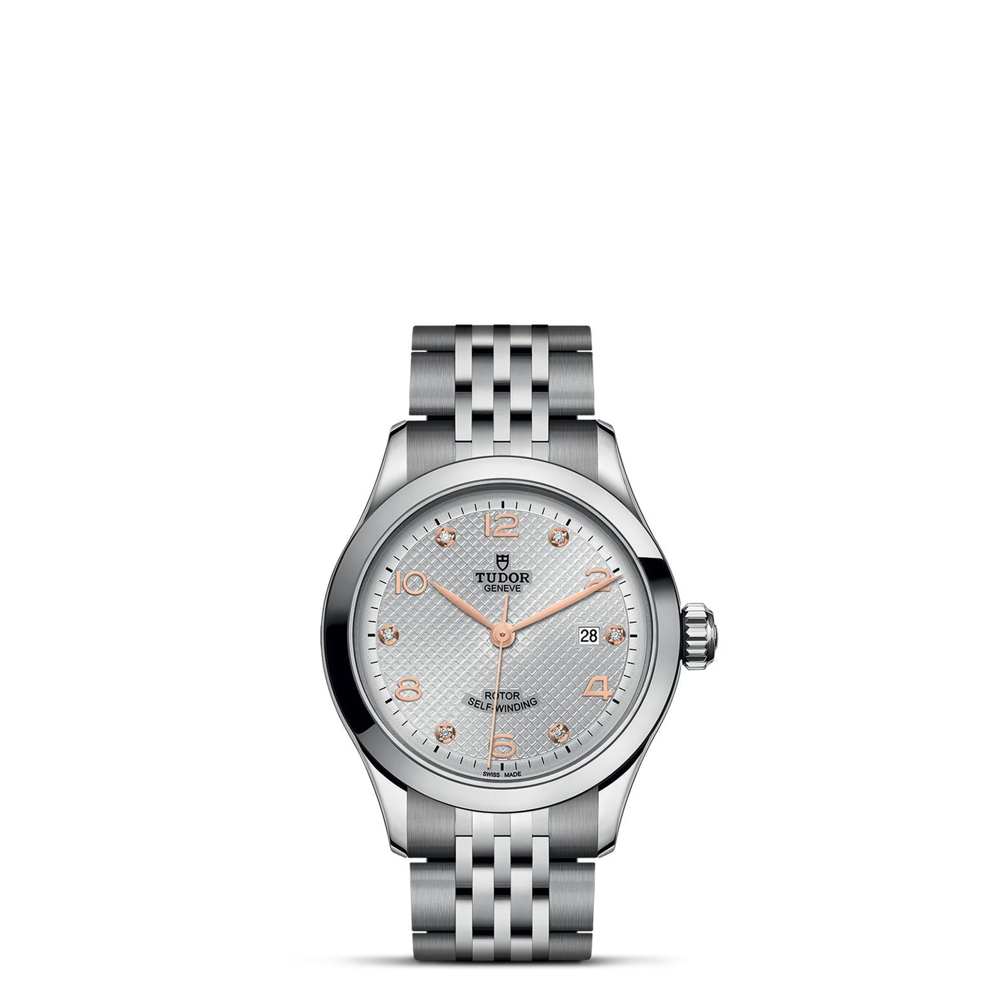 The TUDOR 1926 wristwatch, crafted from stainless steel, boasts a silver dial with elegant rose gold accents. Perfect for mechanical watch aficionados, it includes a date display and a patterned bracelet strap. The Tudor logo is proudly displayed on the dial, complemented by rose gold hour markers.