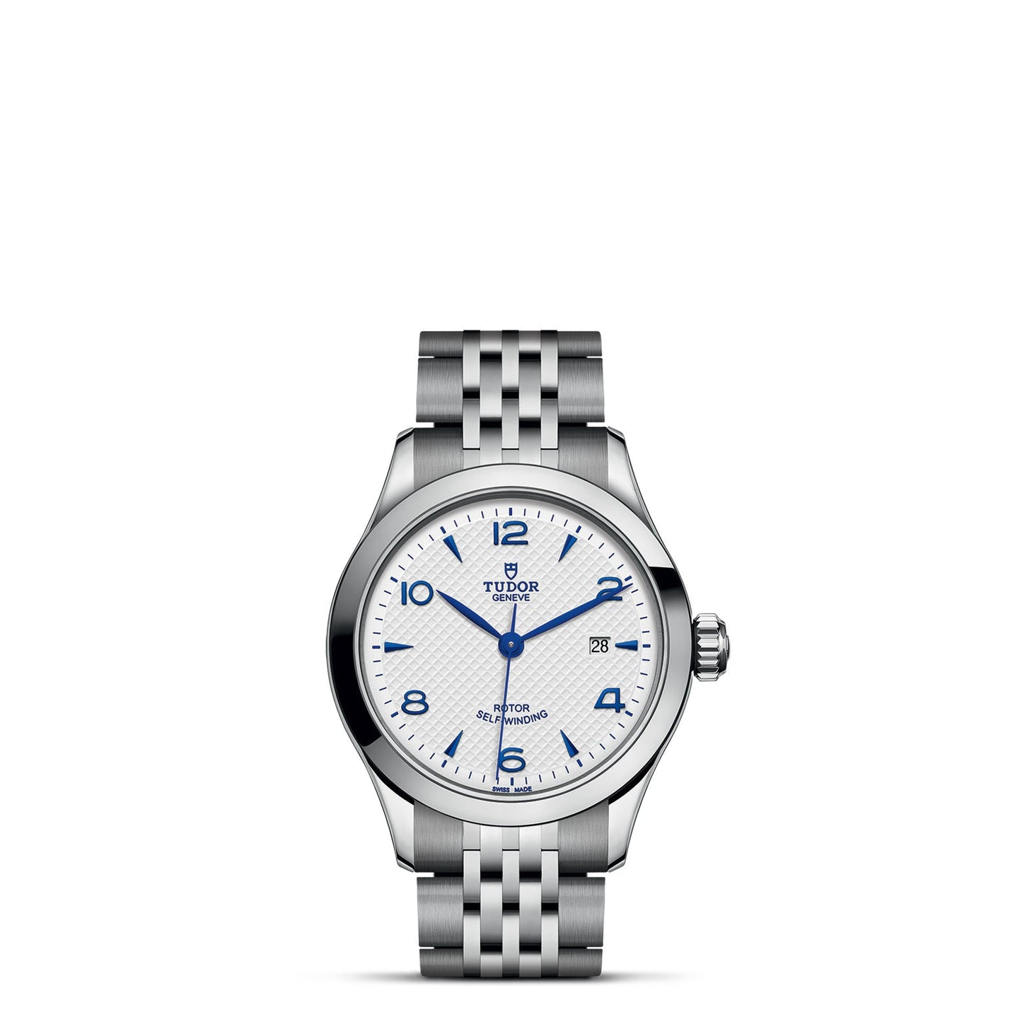 The TUDOR 1926 wristwatch features a silver metal bracelet, white face, blue hour markers and hands, and a date window at 3 o'clock. The brand's logo is elegantly placed below the 12 o'clock mark, showcasing TUDOR's expertise in mechanical watches.