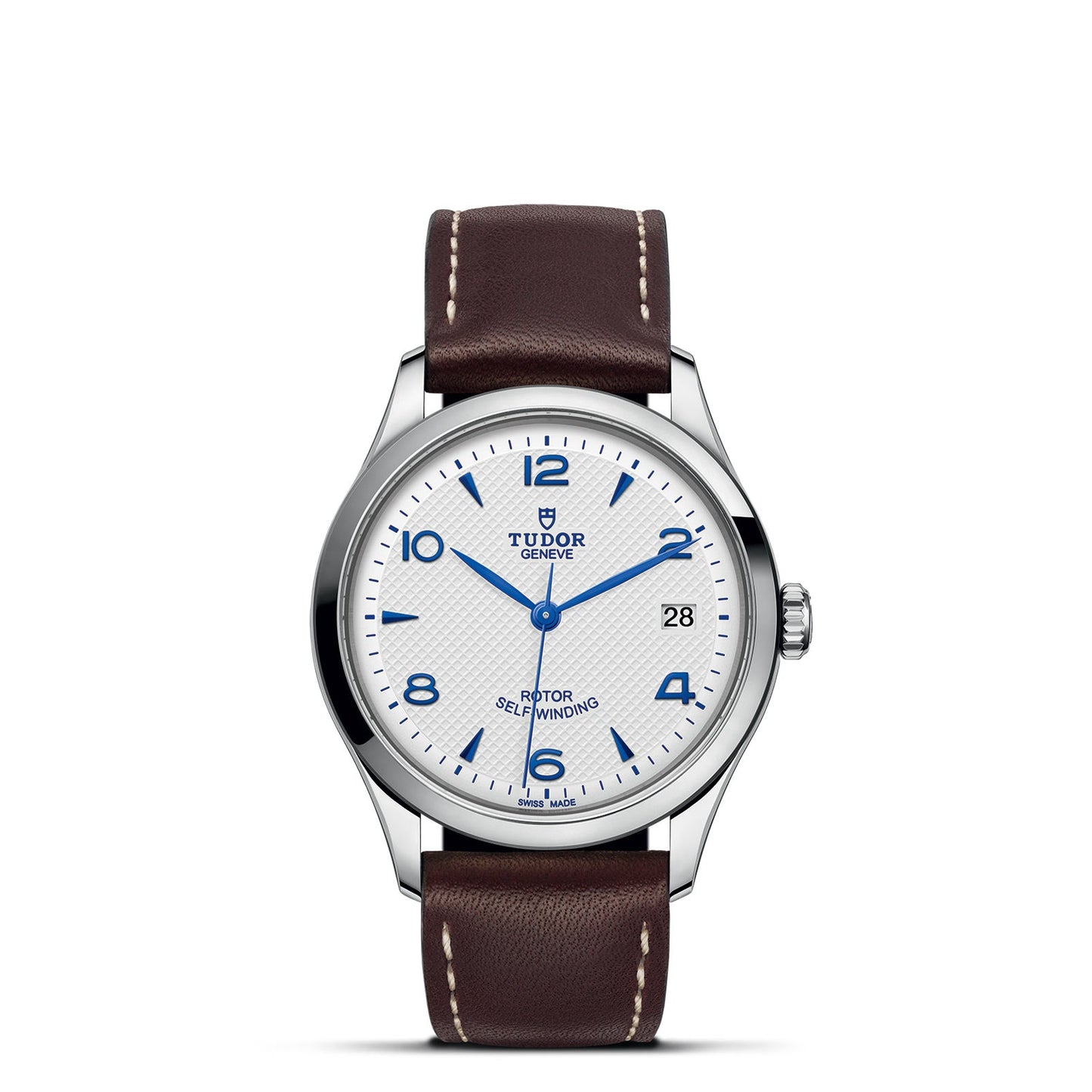 This sophisticated timepiece from the TUDOR 1926 collection boasts a white textured dial with blue numerals and a date function. It features a stainless steel case complemented by a brown leather strap with white stitching, prominently displaying the TUDOR brand name and logo on the watch face.