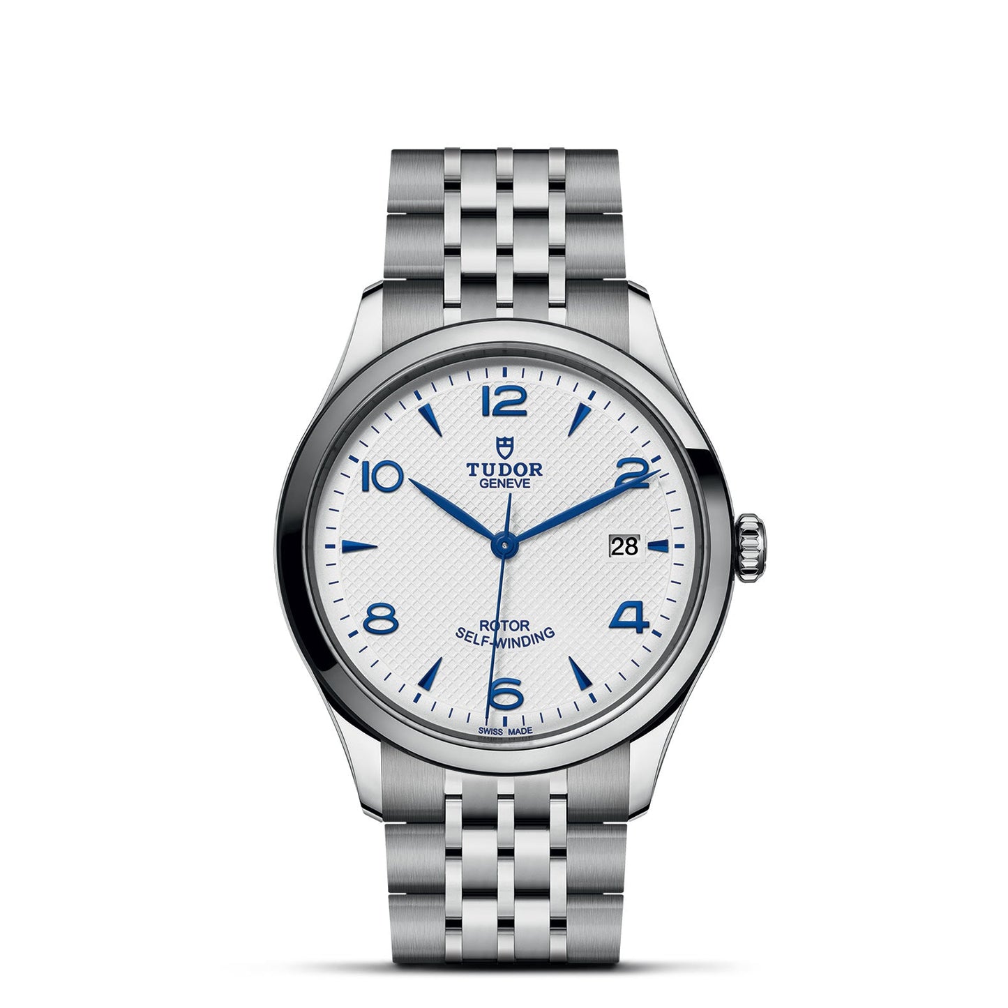 The TUDOR 1926 watch features a silver metal link band, round white face with blue Arabic numerals and hands. A "Rotor Self-Winding" masterpiece, it displays the date, showcasing craftsmanship in mechanical watches.