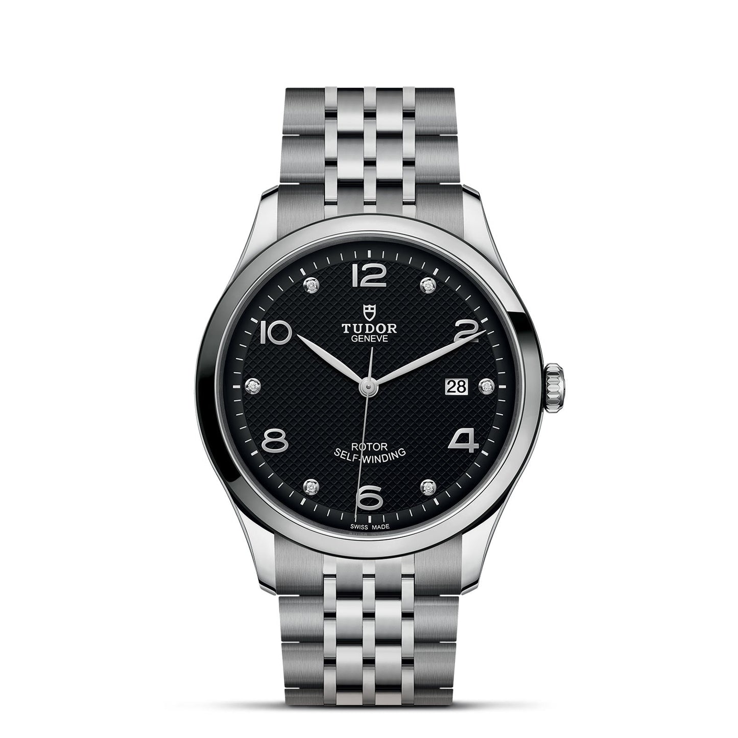 The TUDOR 1926, a silver wristwatch by TUDOR, showcases a black textured dial adorned with white Arabic numerals at 3, 6, 9, and 12 o'clock. It includes a date window at the 3 o'clock position and features diamond markers for other hour positions. This sophisticated timepiece is complemented by a polished stainless steel bracelet.