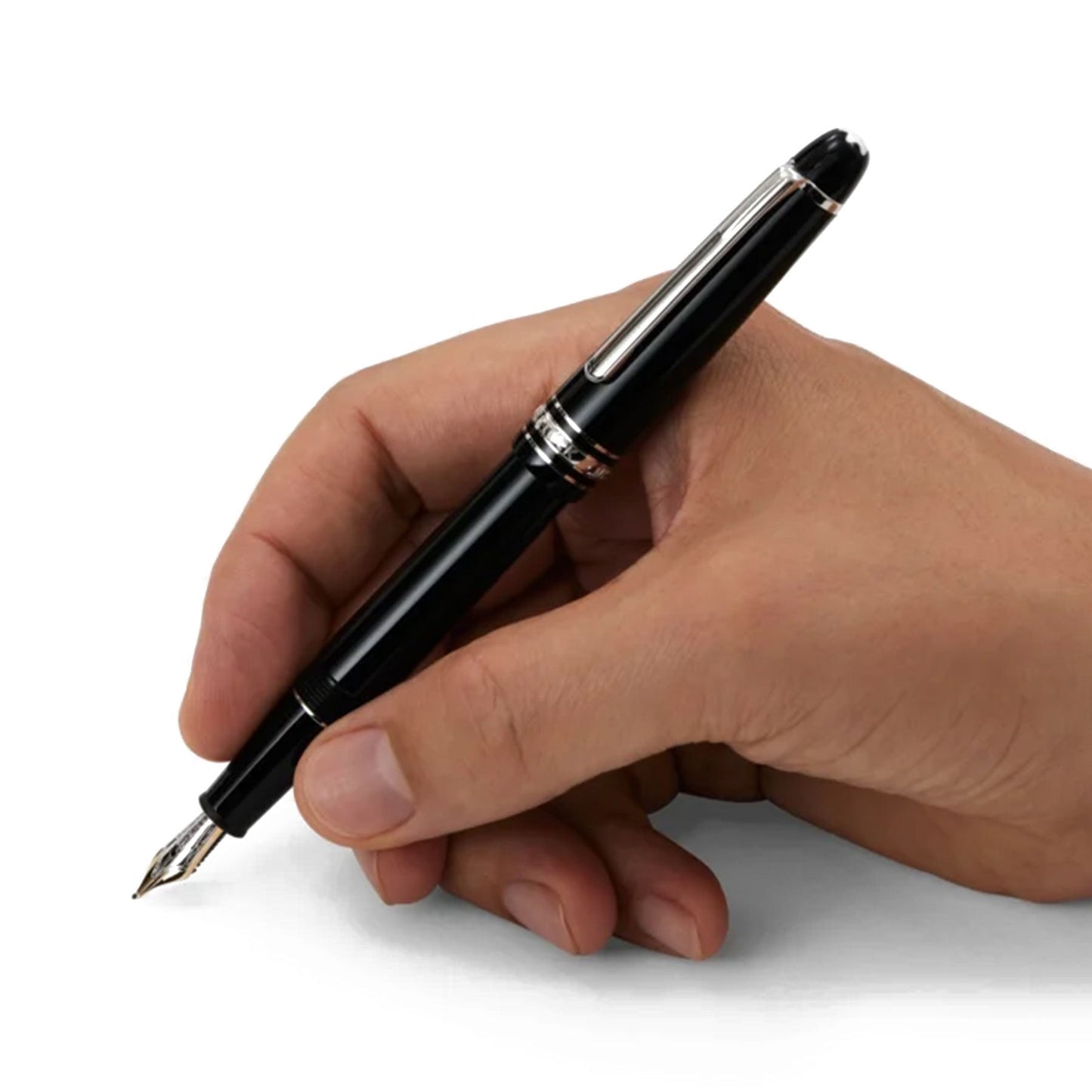 A hand holding a Montblanc Meisterstück Black Resin Platinum Plated Fountain Pen, epitomizing luxury writing, against a plain white background.
