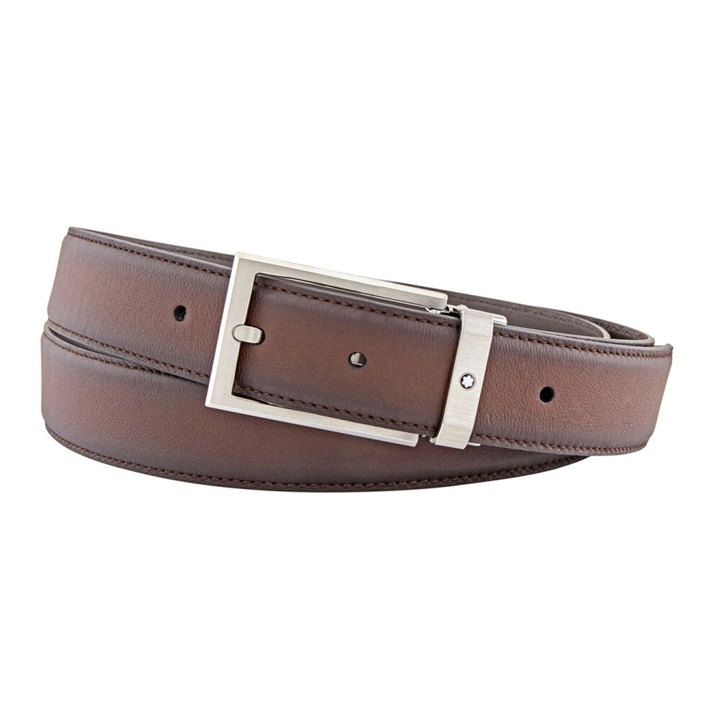 The Montblanc Classic Brown Leather Belt, crafted with coiled brown leather and a silver buckle, highlights two visible stitched edges and adjustment holes while being artfully displayed against a plain white background.