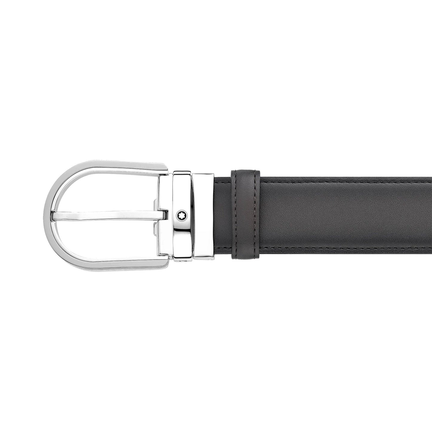 A close-up of a Montblanc Horseshoe Leather Belt, featuring a shiny silver buckle. The black leather belt is neatly rolled and partially extended into the frame, highlighting its smooth texture and sleek design.