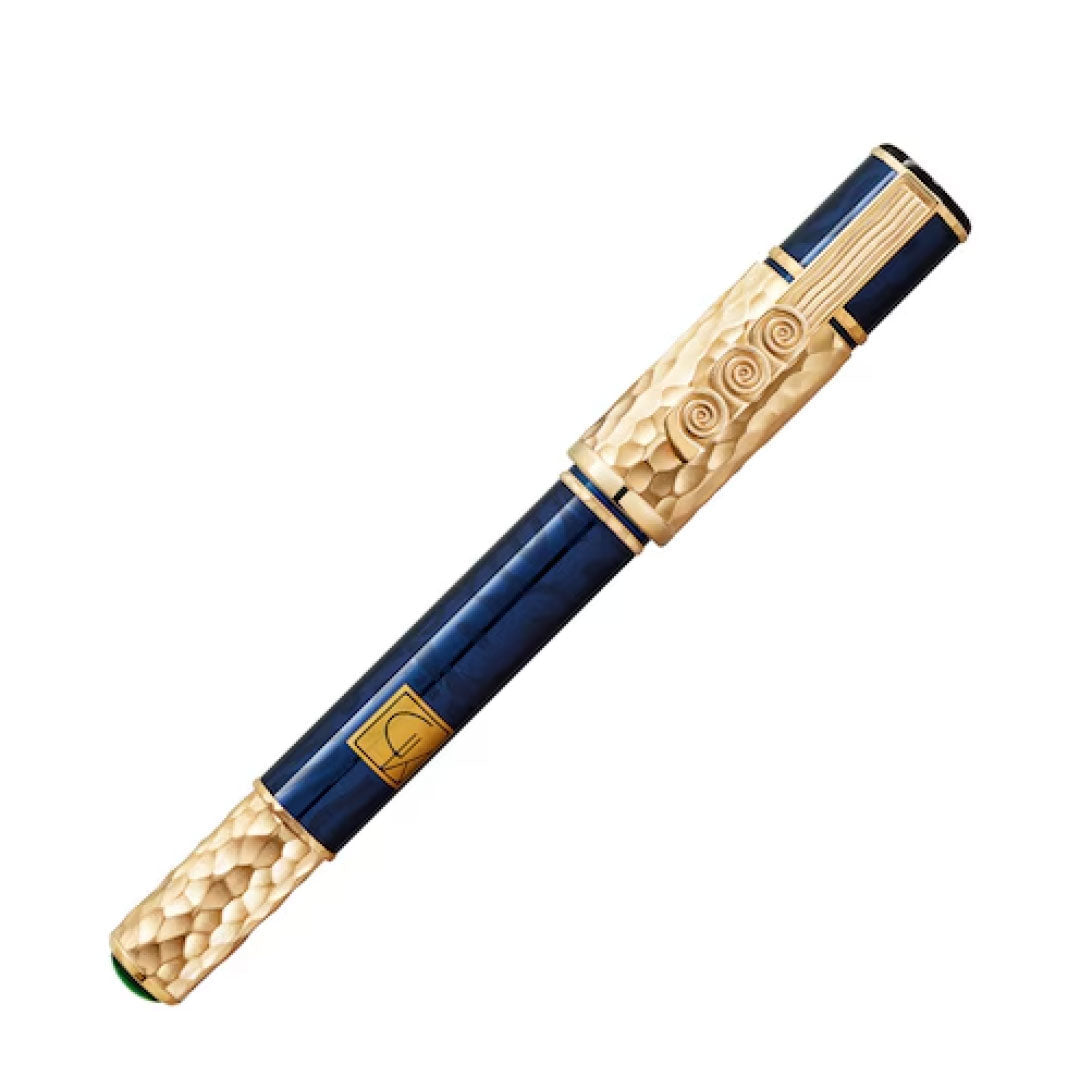 This elegant fountain pen, the Montblanc Masters Of Art Homage To Gustav Klimt Limited Edition, boasts a blue barrel along with a detailed gold nib and cap. It echoes Gustav Klimt's Vienna Secession style by incorporating swirling patterns and textured gold embellishments.