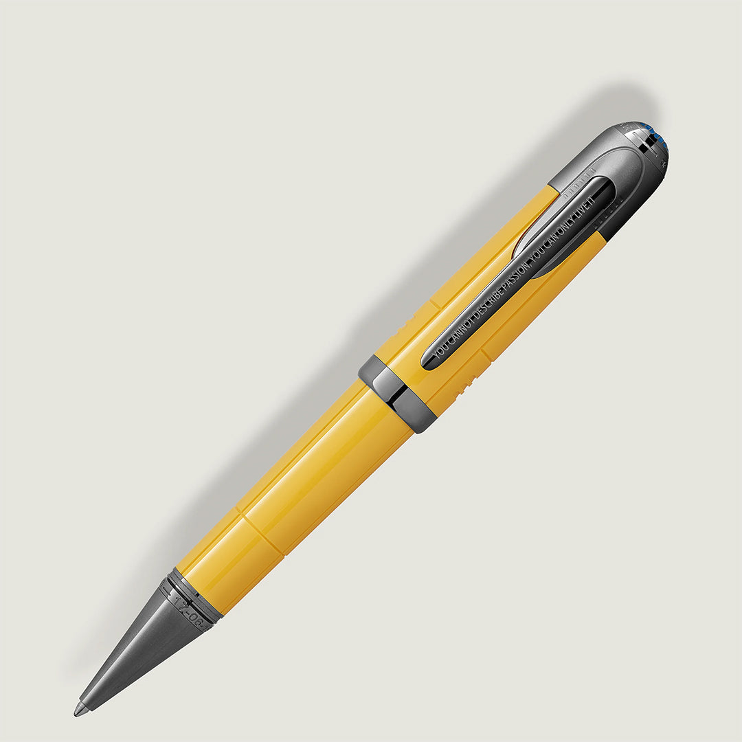 A sleek Montblanc Great Characters Enzo Ferrari Special Edition Giallo Modena ballpoint pen, featuring a modern yellow and gray design with metallic accents, a cap clip, and cylindrical shape reminiscent of Enzo Ferrari's racing legacy in elegant style.