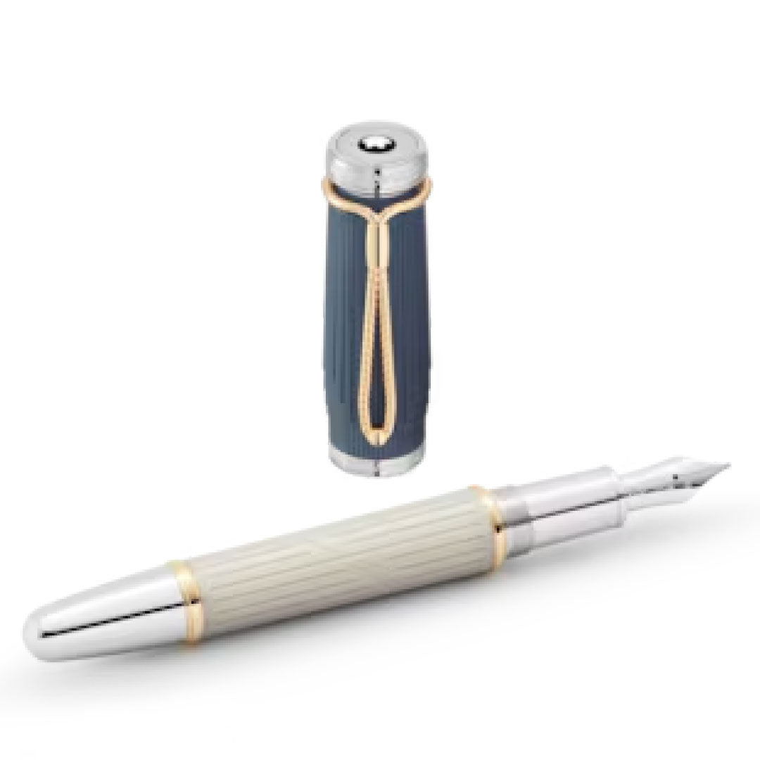 The Montblanc Writers Edition Homage to Jane Austen Limited Edition Fountain Pen is a luxurious writing instrument featuring a silver and cream-colored barrel with gold accents and an intricately designed nib that exudes elegance reminiscent of the Regency era. The dark cap, adorned with gold detailing, pays homage to the timeless classics of Jane Austen, gracefully resting above the pen.