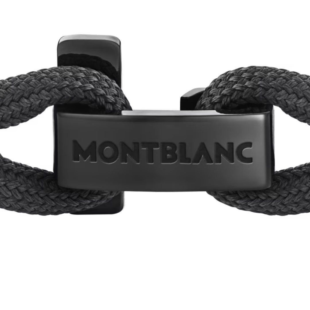 Close-up of the Montblanc T-Hook Nylon & Steel Bracelet, showcasing its black braided design and a shiny stainless steel clasp engraved with "MONTBLANC." The intricate braiding pairs beautifully with the sleek, polished finish, while the T-Hook closure introduces a contemporary element.