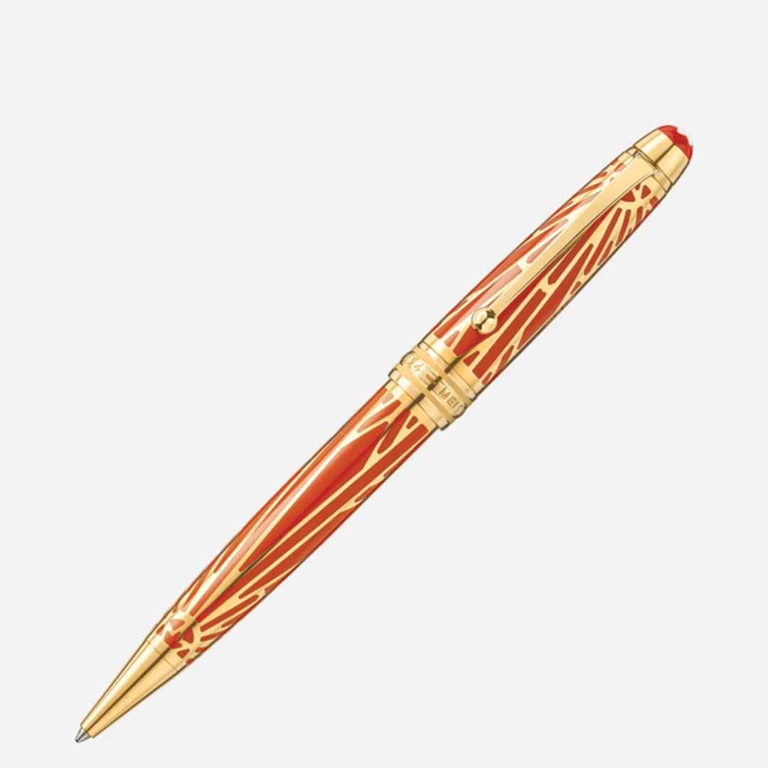 A luxurious Montblanc Meisterstuck The Origin Collection Solitaire Midsize Ballpoint Pen with intricate gold patterns and accents, angled on a white background. This fine writing instrument showcases a sleek design and elegant detailing, exuding sophistication.