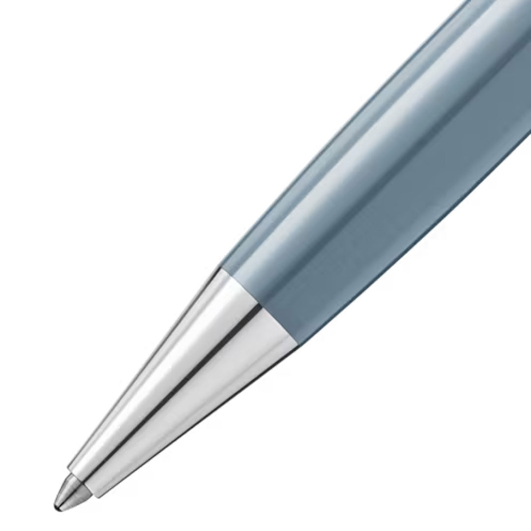 Close-up of a Montblanc Meisterstück x Olympic Heritage Chamonix 1924 Doué Classique Ballpoint pen tip with a shiny silver nib, featuring a precious resin barrel, on a white background.