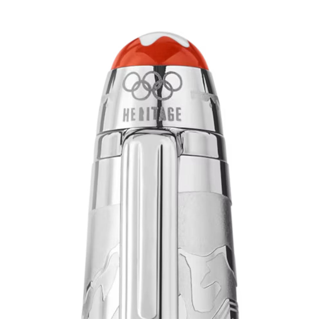 Detailed view of the Montblanc Meisterstück x Olympic Heritage Chamonix 1924 Doué Classique Ballpoint pen cap, highlighting the Olympic rings and the word "HERITAGE." The top features an orange and white design that accentuates its exceptional craftsmanship, reflecting the legacy of the Chamonix 1924 Olympic Games.