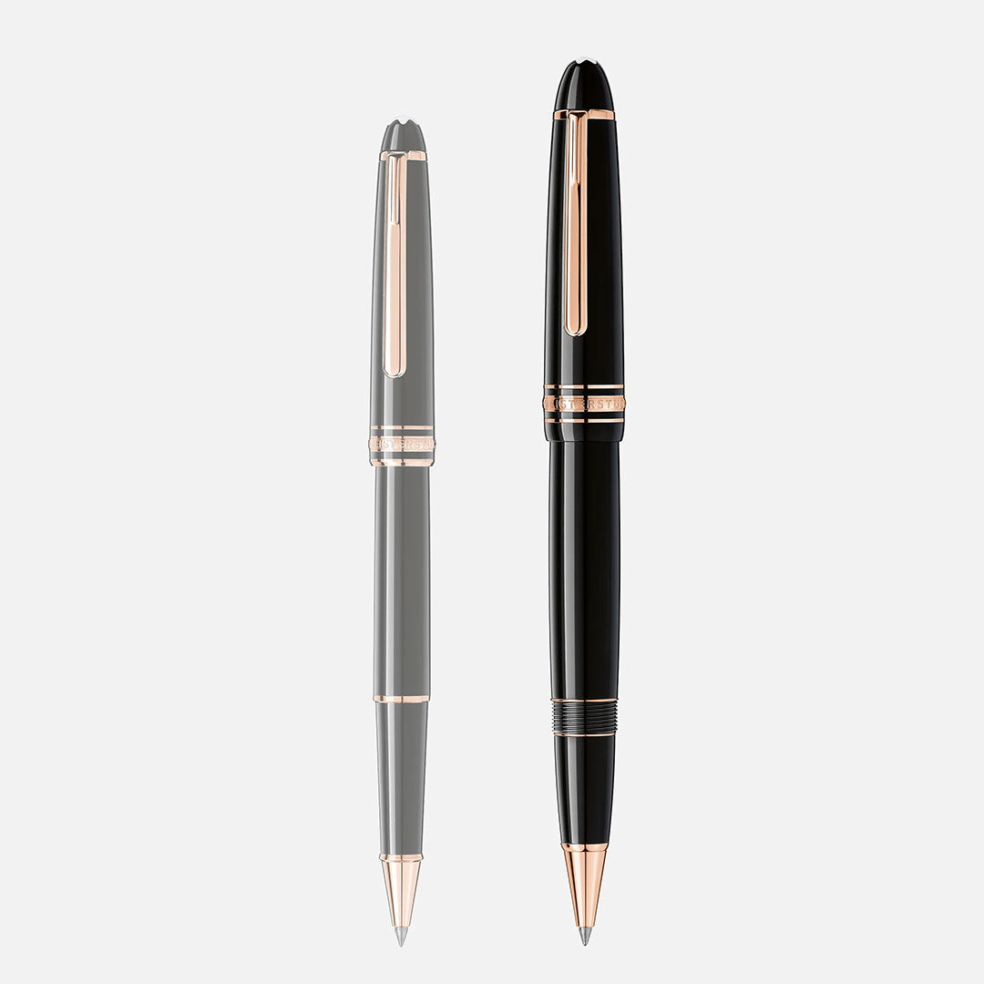 The Montblanc Meisterstuck Rose Gold Coated Legrand Rollerball Pen stands upright on a light gray background—one capped and one uncapped—showcasing Montblanc’s luxurious craftsmanship.