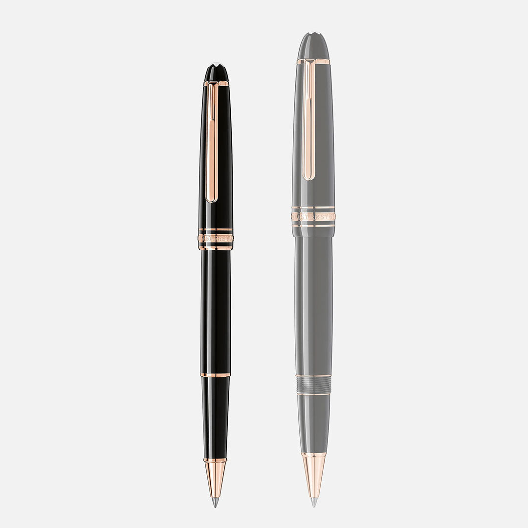 Two Montblanc Meisterstück Rose Gold Coated Rollerball Pens, one solid and one semi-transparent, rest side by side against a white background, embodying luxury writing with their elegant design and rose-gold accents.