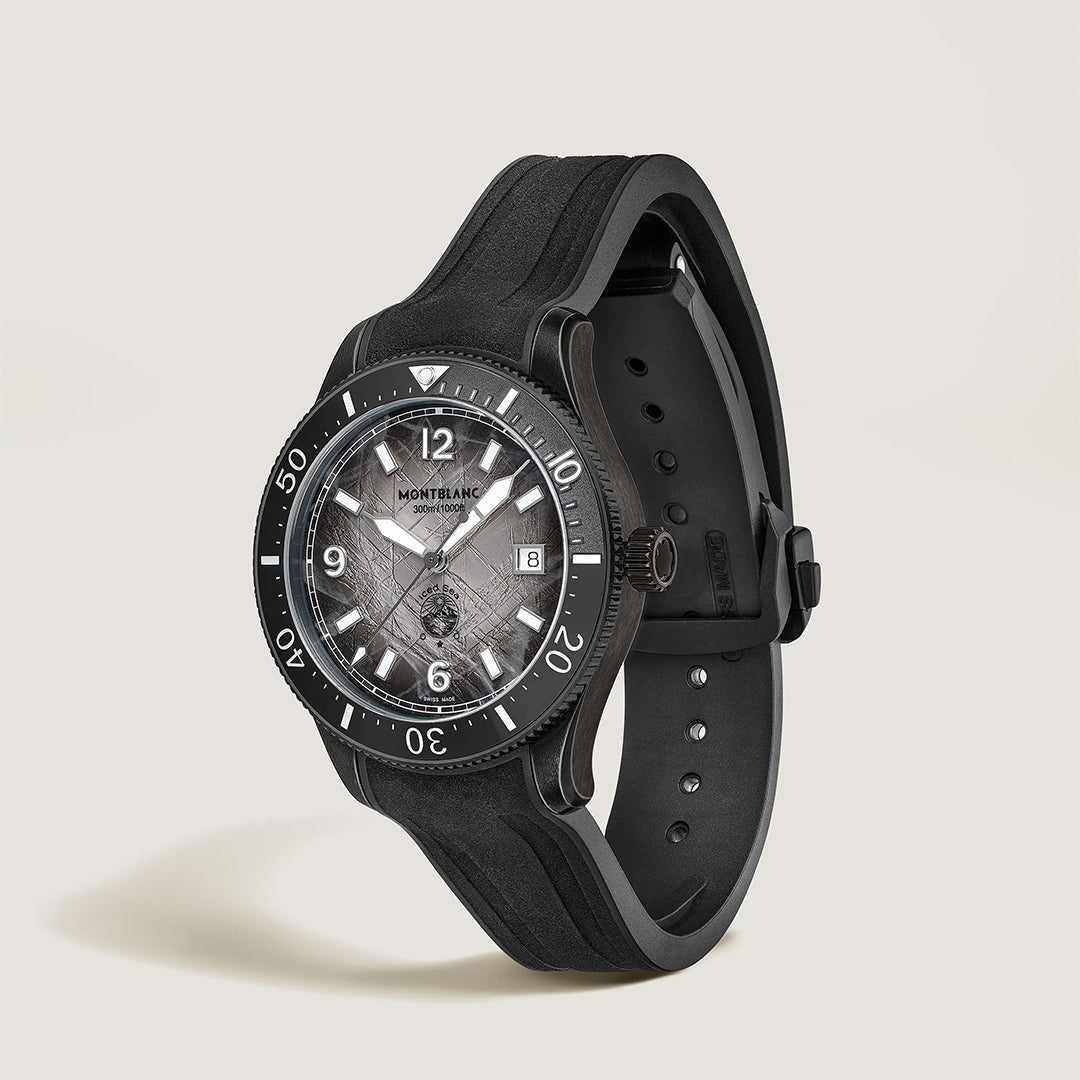 The Montblanc Iced Sea Automatic Date 0 Oxygen 41mm Watch features a glacier pattern dial, round face, white markers, black bezel and strap, plus a date display, shown at an angle on a plain light background.