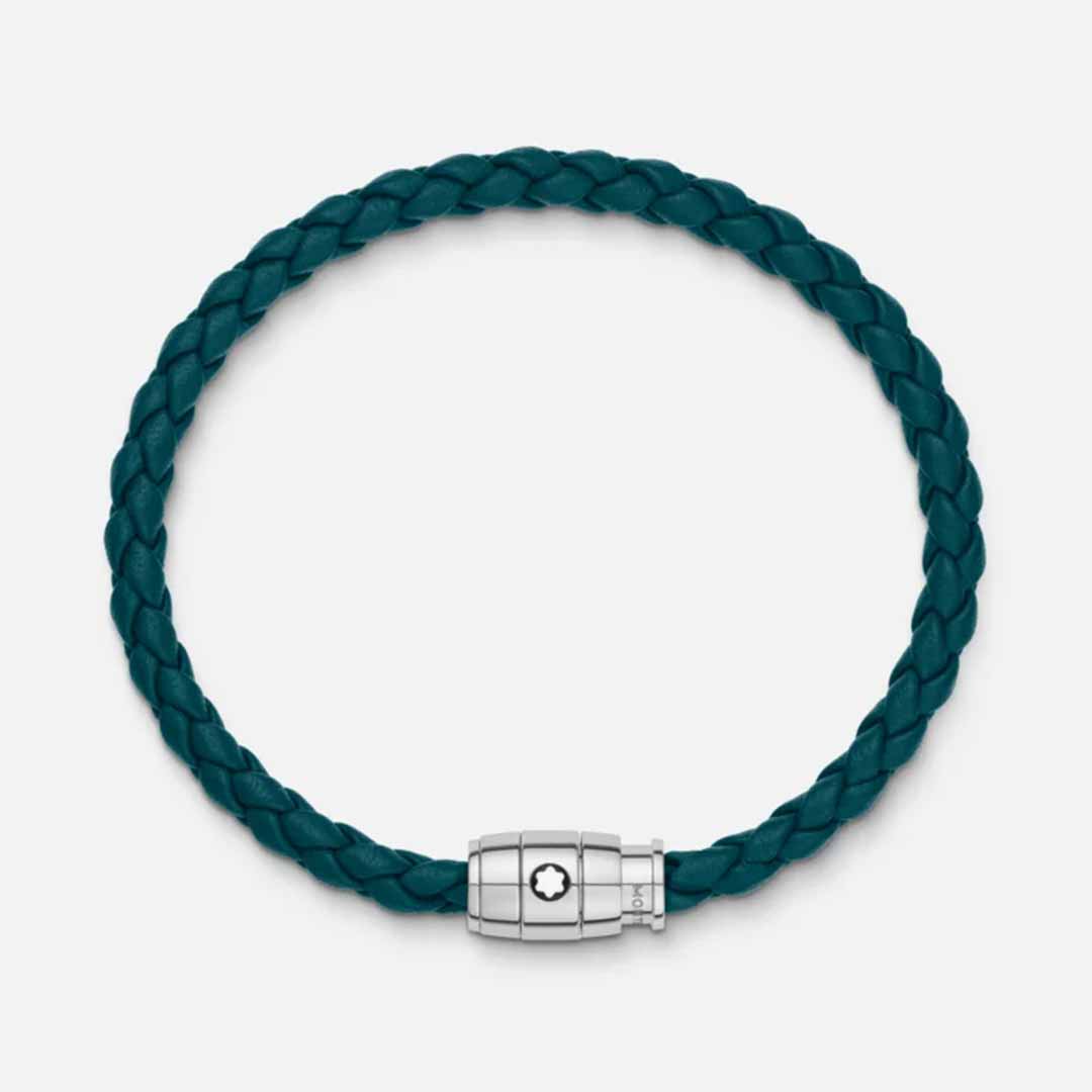 The Montblanc Meisterstuck Collection Steel 3-Ring Cyprus Blue Leather Bracelet, adorned with a Montblanc emblem, is elegantly displayed on a plain white background, highlighting its intricate braided design and stainless steel clasp.