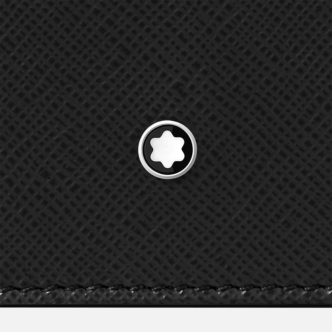 The Montblanc 5-Pen Leather Zip Pouch showcases a textured black saffiano leather surface with a silver emblem featuring a white star-like design, positioned near the bottom edge, adding elegance to this piece.