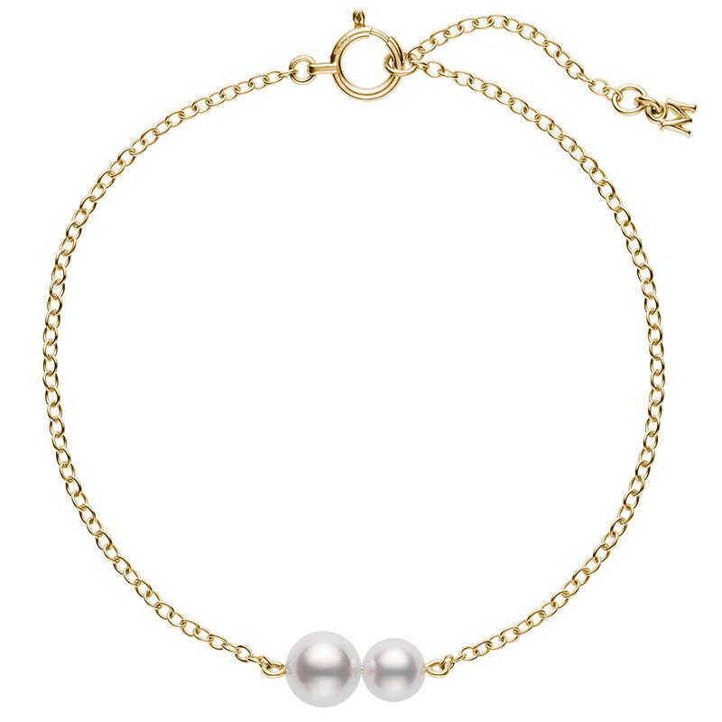 Adorn your wrist with the Mikimoto 18K White Gold Akoya Cultured Pearl Station Bracelet, featuring two lustrous Akoya cultured pearls at the center and a delicate “M” charm on the adjustable clasp. Crafted by Mikimoto in exquisite 18K white gold, this simple yet sophisticated design stands out beautifully against any background.