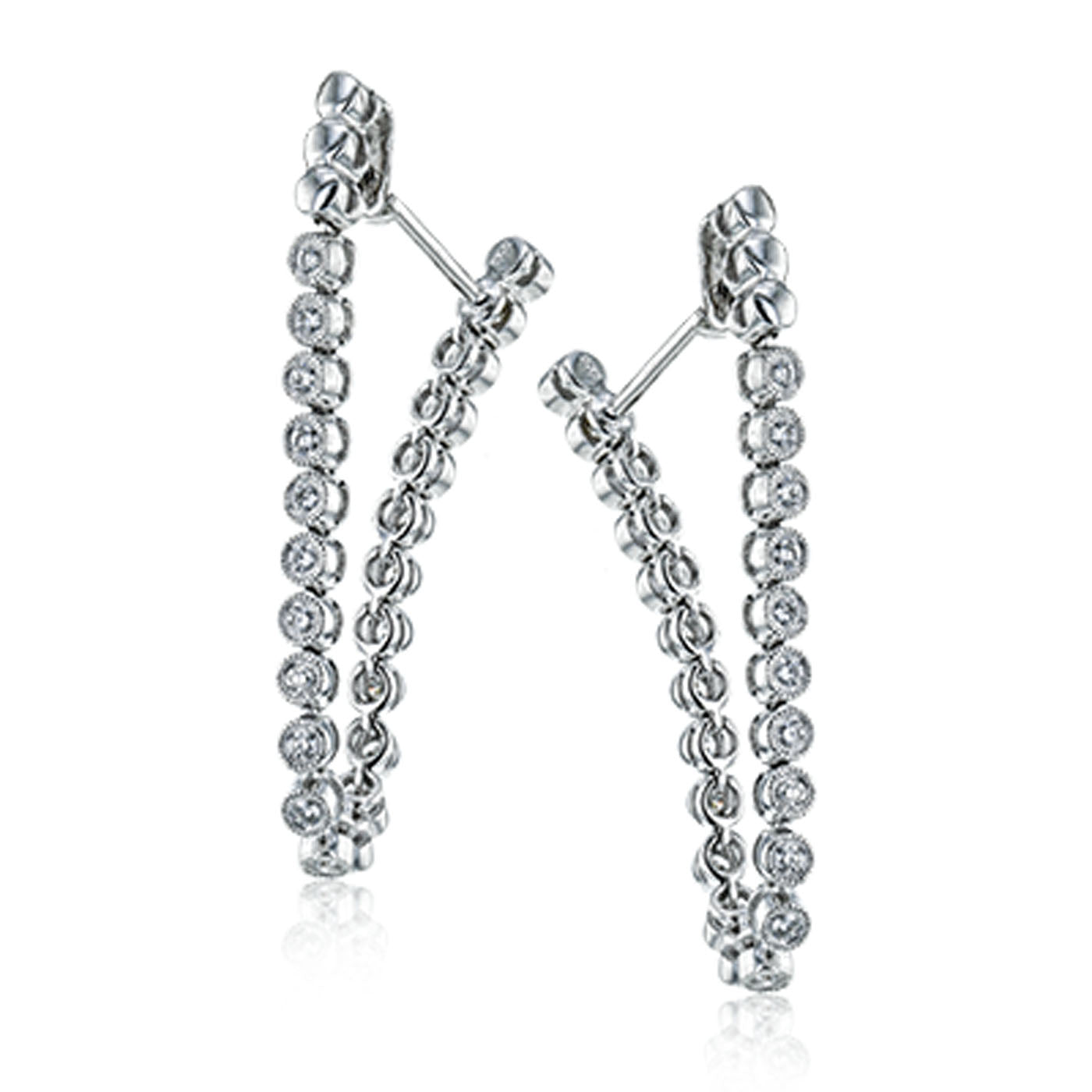 The Simon G. 18K White Gold Diamond Hoop Earrings from Simon G. are a versatile addition to any jewelry collection, featuring small circular diamonds set in a refined design. These elegant hoops, with their unique transformable style, effortlessly enhance any outfit with their sophisticated charm.