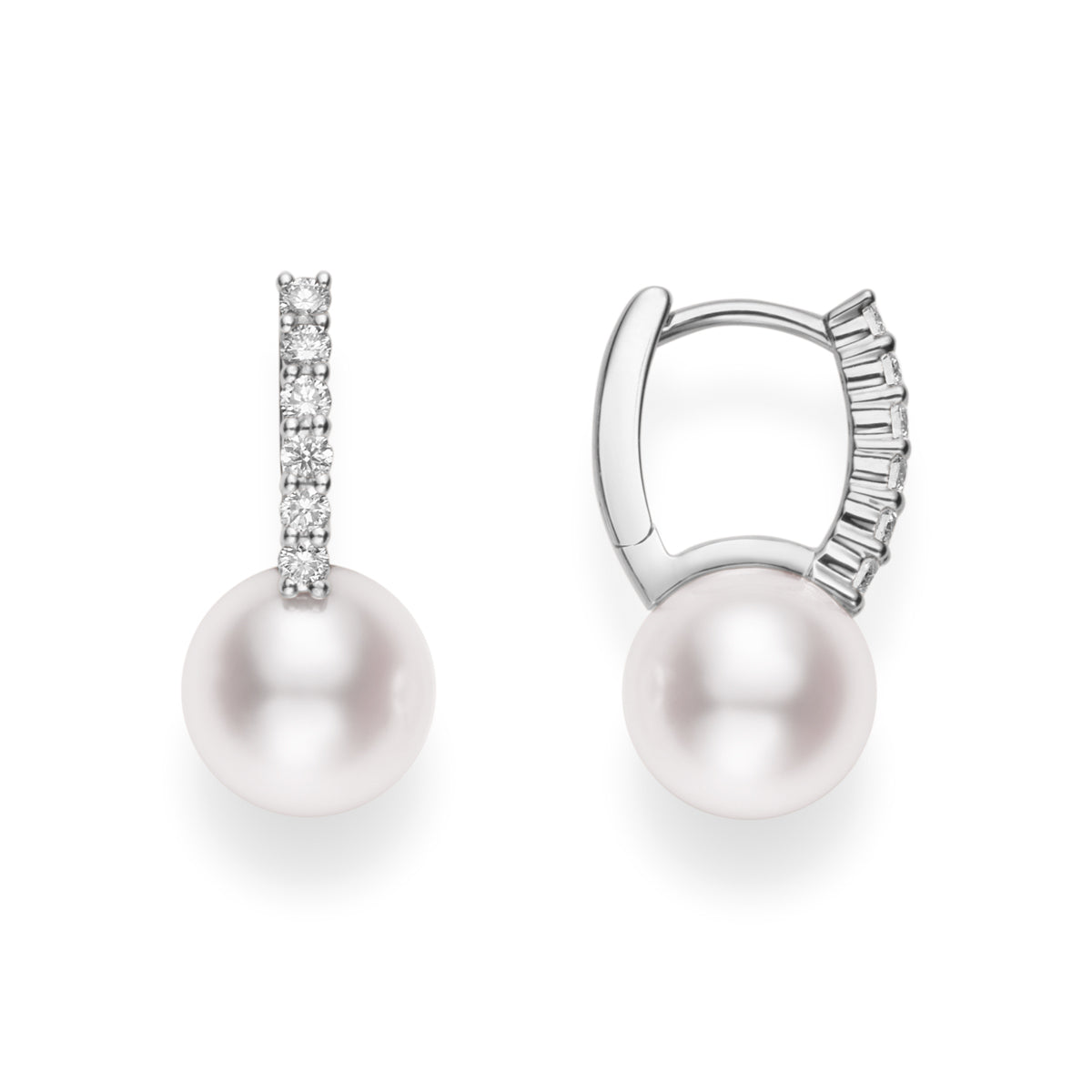 Introducing the Mikimoto Classic Elegance 18K White Gold Diamond with Akoya Cultured Pearl Huggie Earrings, featuring elegant silver pearls. Each earring showcases a row of small sparkling diamonds along the 18-karat white gold hoop, with cultured pearls gracefully dangling beneath.