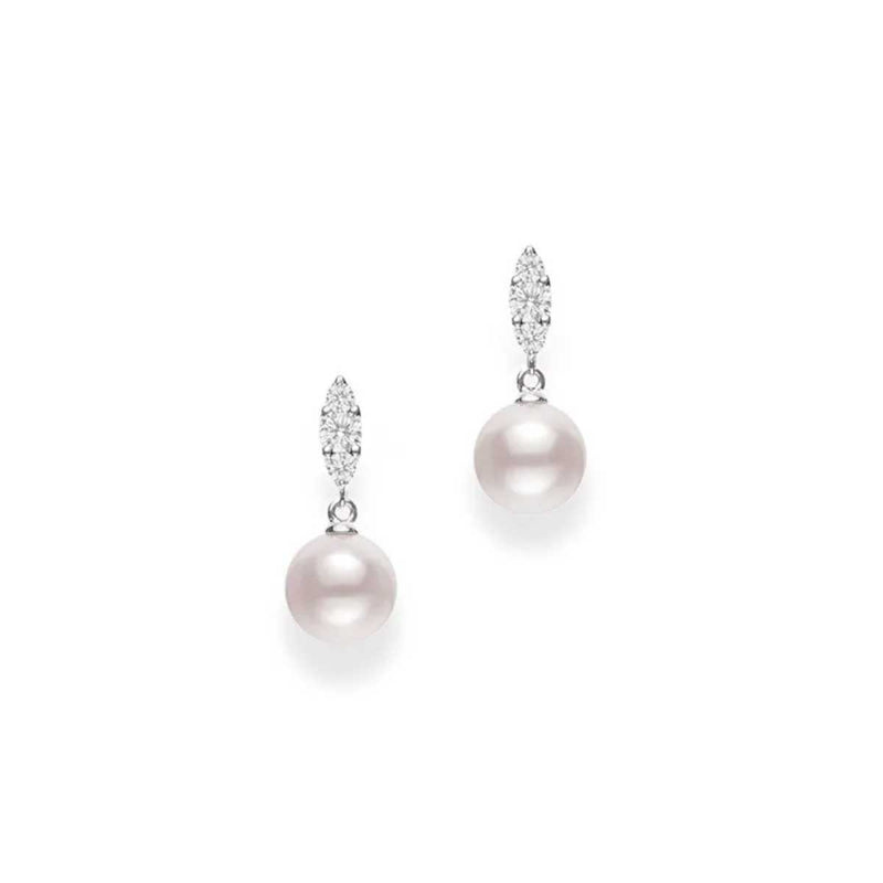 Introducing the exquisite Mikimoto Morning Dew drop earrings, showcasing round Akoya cultured pearls elegantly suspended from a dazzling diamond-studded marquise-shaped setting, crafted in 18k white gold and presented on a pristine white background.