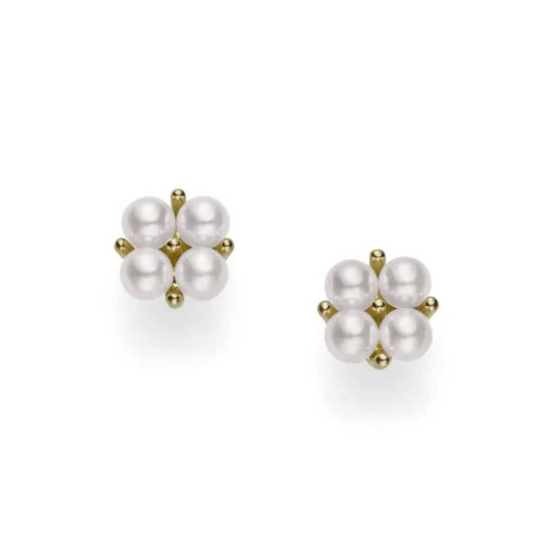 The Mikimoto 18K Yellow Gold Akoya Cultured Pearl Stud Earrings display an elegant arrangement of four small Akoya pearls secured in gold prongs, creating a symmetrical floral pattern against a white backdrop.