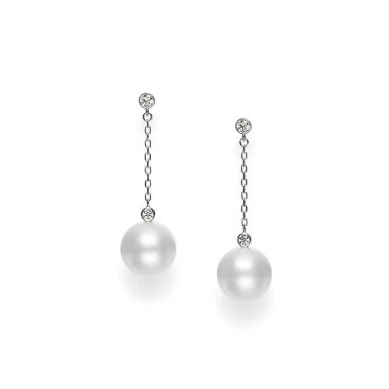 The Mikimoto 18K White Gold Diamond and South Sea Cultured Pearl Drop Earrings showcase a refined design, with delicate chains adorned with small diamonds at the top and large South Sea pearls at the bottom, all set against a plain white background.