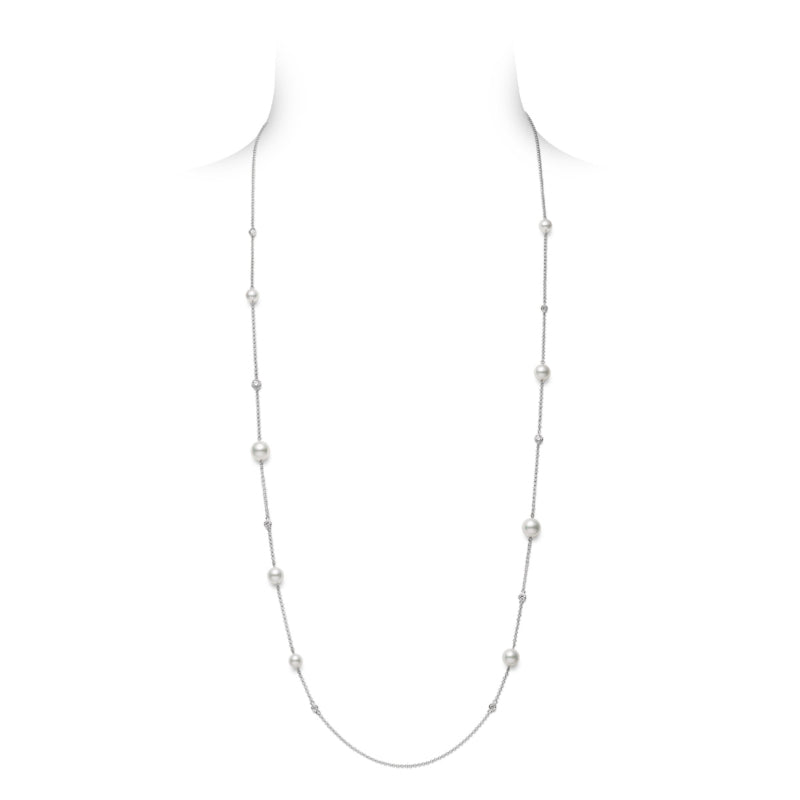 The Mikimoto 18K White Gold Diamond with Akoya Cultured Pearl Station Necklace is elegantly showcased against a plain white background, featuring evenly spaced Akoya pearls.