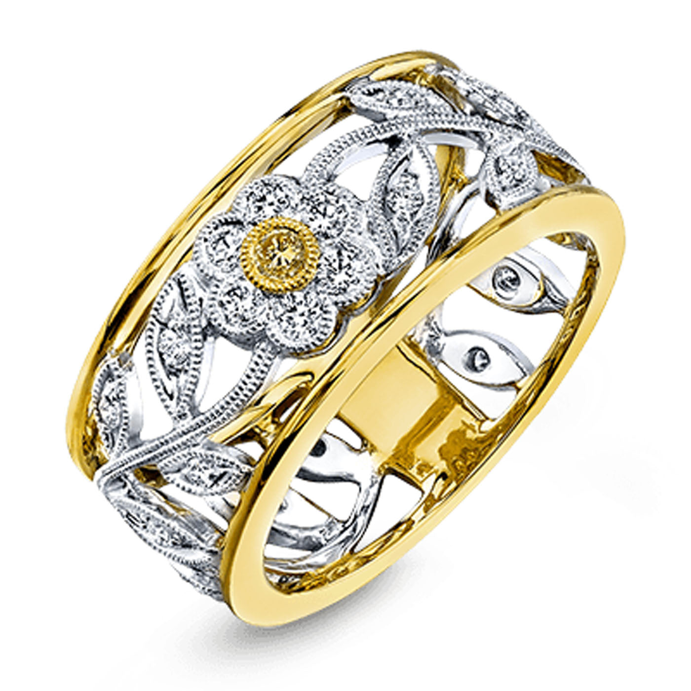 The Simon G. 18K Yellow and White Gold Fashion Diamond Ring is an elegant vintage-style piece with intricate gold and silver filigree, showcasing a central floral motif accented with white diamonds.