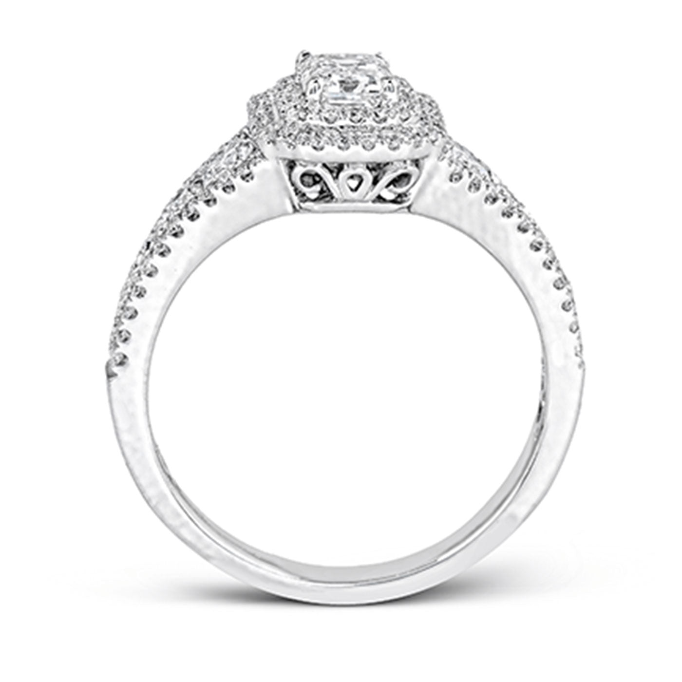 Introducing the Simon G. 18K White Gold Emerald Diamond Ring, a masterpiece from Simon G that features an intricately designed band adorned with small sparkling stones. At its center, this exquisite piece showcases a dazzling square-cut diamond in an elegant emerald head setting.