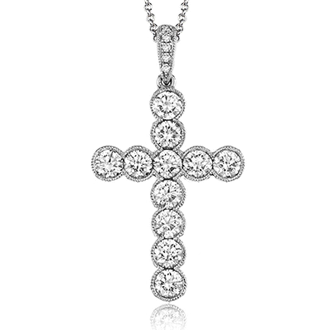 The Simon G. 18K White Gold Diamond Cross Necklace Pendant features round cut diamonds set in a row forming a cross, suspended from a delicate chain.