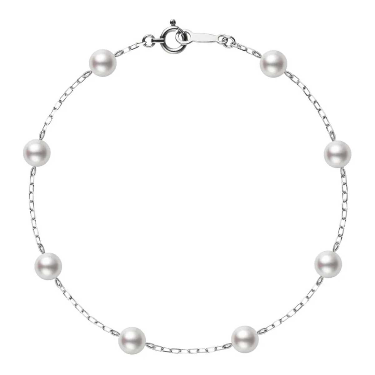 This elegant bracelet from Mikimoto features stunning 18K white gold chain links with evenly spaced Akoya cultured pearls and is securely fastened with a lobster clasp closure.