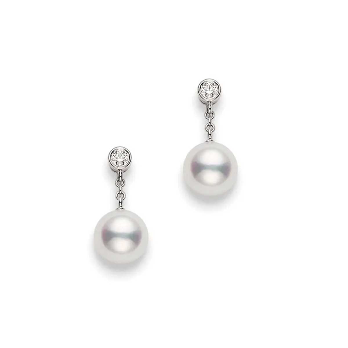 The Mikimoto 18K White Gold Diamond Akoya Cultured Pearl Drop Earrings for a touch of elegance, featuring round, lustrous pearls gracefully suspended from sparkling diamonds.