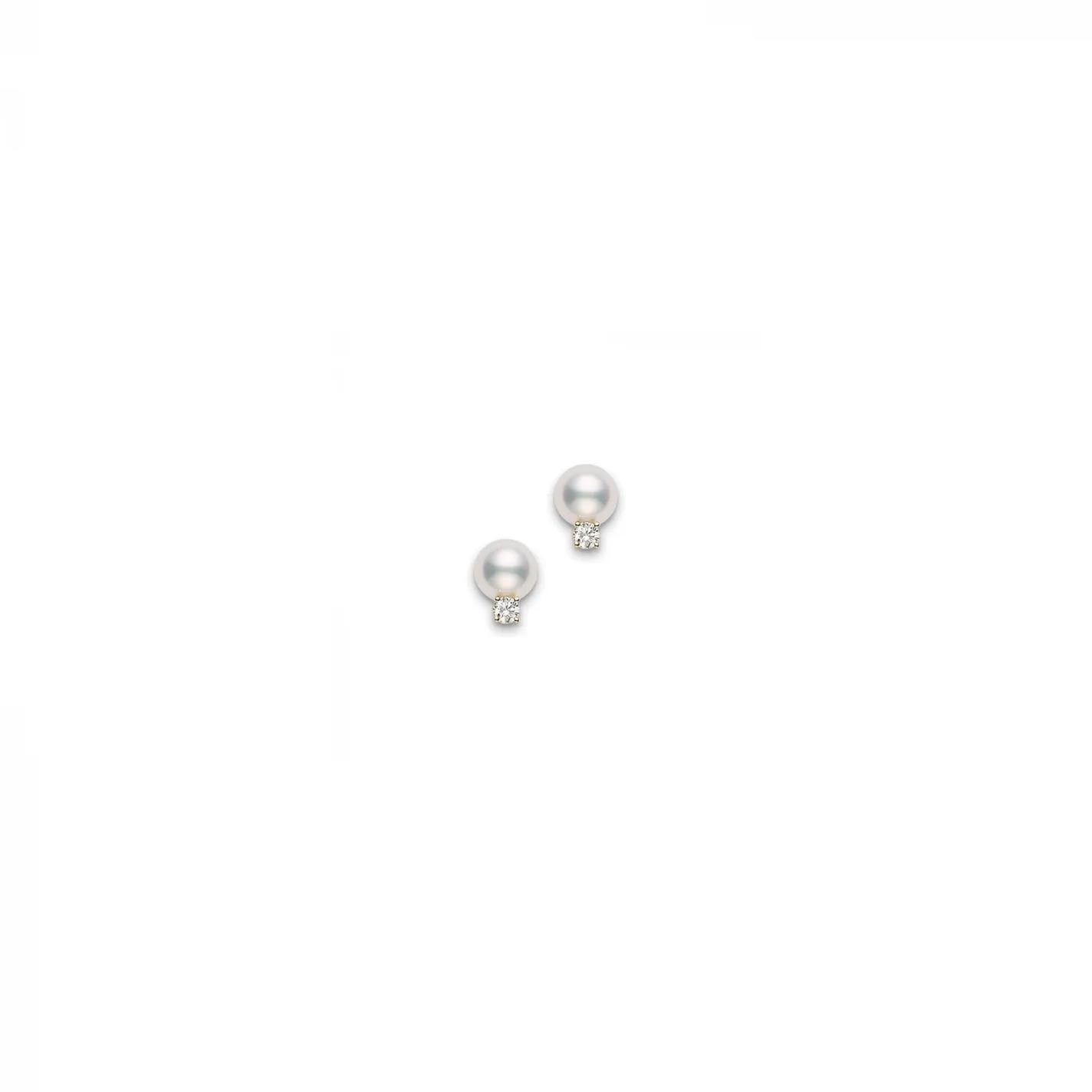 Introducing the Mikimoto 18K Yellow Gold Diamond with Akoya Cultured Pearl Stud Earrings: these elegant earrings showcase a beautiful pearl and a small round diamond, all set in a minimalist design against an exquisite 18 karat yellow gold backdrop.