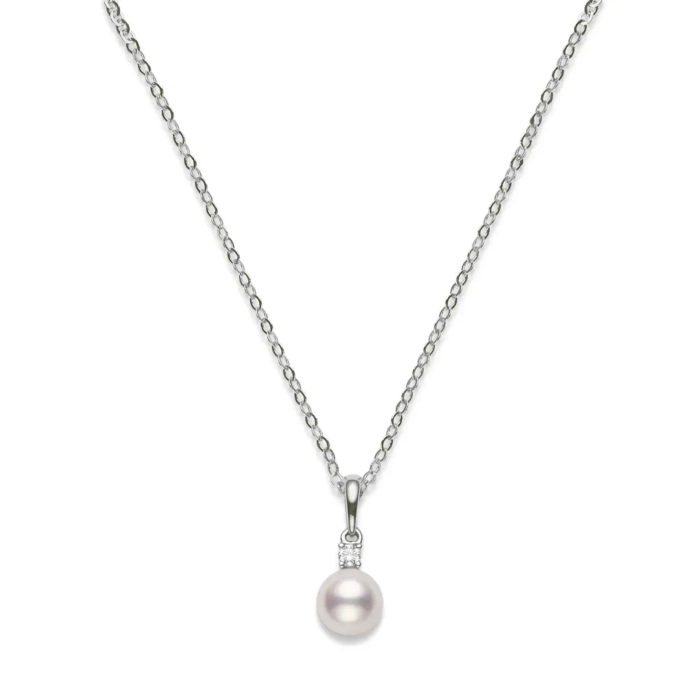 A Mikimoto 18K white gold necklace featuring a delicate chain and a South Sea pearl pendant with diamonds.