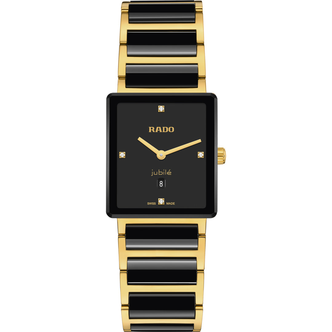 The RADO Integral Diamonds Quartz 28mm Watch features a rectangular black dial, gold-tone case, ceramic bracelet, diamond hour indices, and a date window above 6 o’clock.