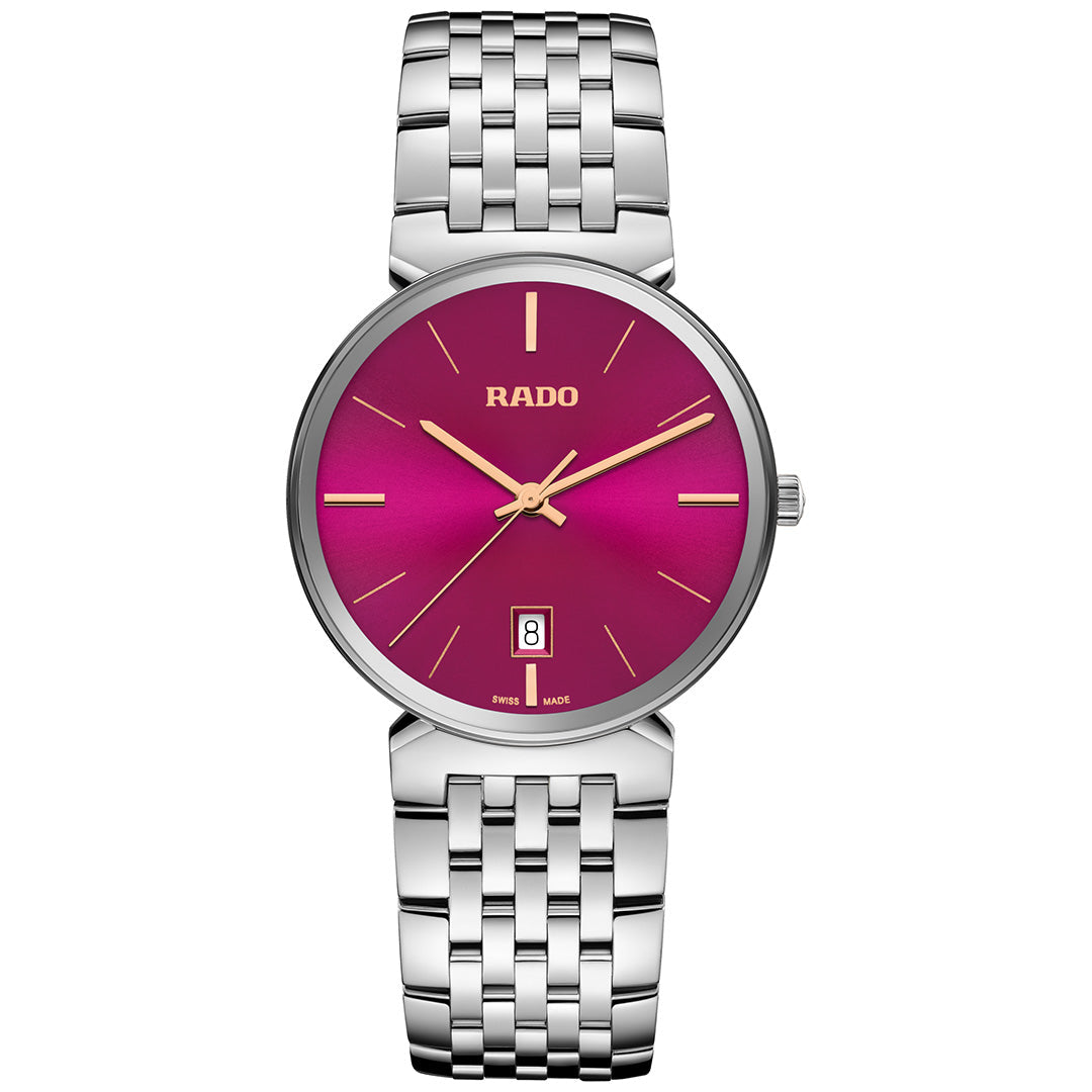 The RADO Florence Quartz 38mm Watch features a silver metallic band, vibrant magenta face, gold hands and markers, date window at 6 o’clock, and durable sapphire crystal.