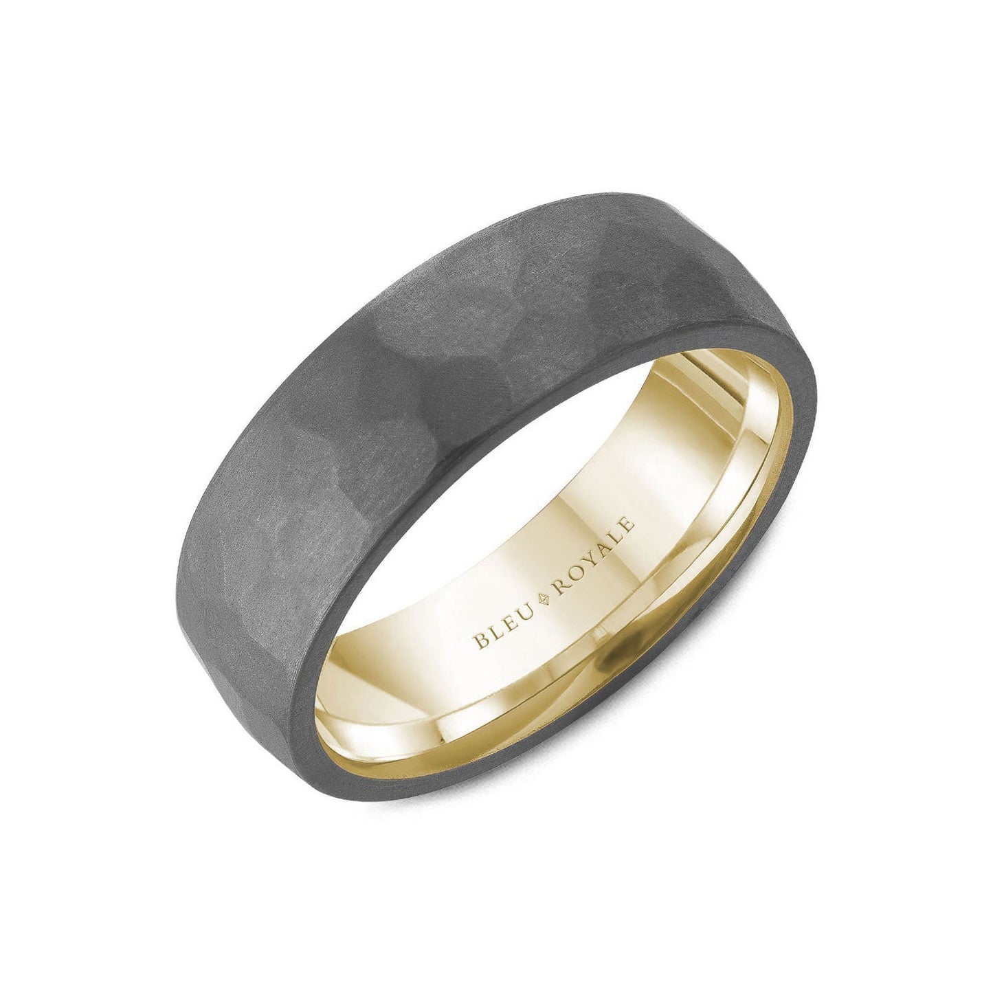The Crown Ring Bleu Royale Tantalum and 14K Yellow Gold Men's Wedding Band features a matte black hammered tantalum exterior with a polished 14K yellow gold interior. The inner band is engraved with "BLEU ROYALE," creating a simple yet elegant design that highlights contrasting textures and colors.