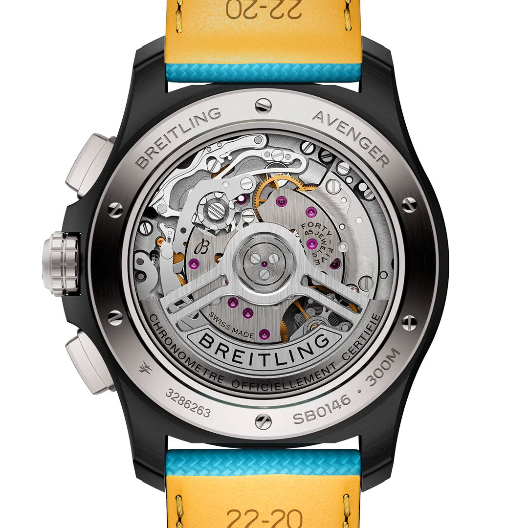 Close-up of the BREITLING Avenger B01 Chronograph 42 Night Mission’s back, highlighting its detailed automatic movement through a clear case back. Visible gears and engravings stand out, paired with a yellow strap on this stainless steel Breitling watch.