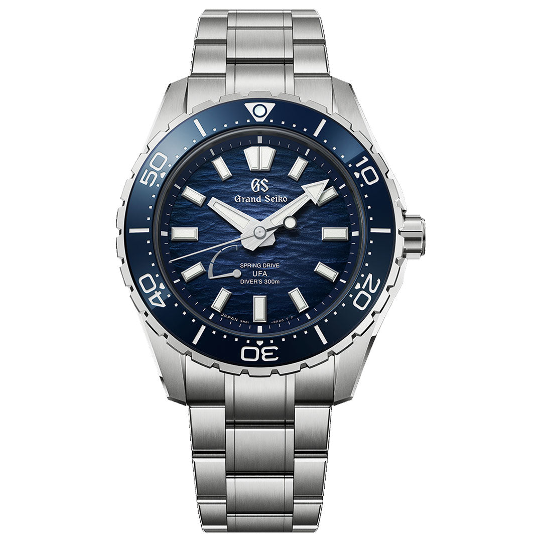 The Grand Seiko Evolution 9 Spring Drive U.F.A Ushio 300 Diver 40.8mm Watch features a blue textured dial, luminous markers, rotating bezel, stainless steel bracelet, Caliber 9RB2 movement, and is water-resistant to 200 meters.
