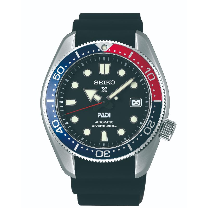 The Seiko Prospex Sea Automatic with Manual Winding 44mm watch, from the renowned brand Seiko, boasts a black dial adorned with circular and rectangular hour markers, and includes a date display at the 3 o'clock position. This timepiece also features a striking red and blue rotating bezel paired with a black strap, making it an ideal choice for adventure seekers and diving enthusiasts.