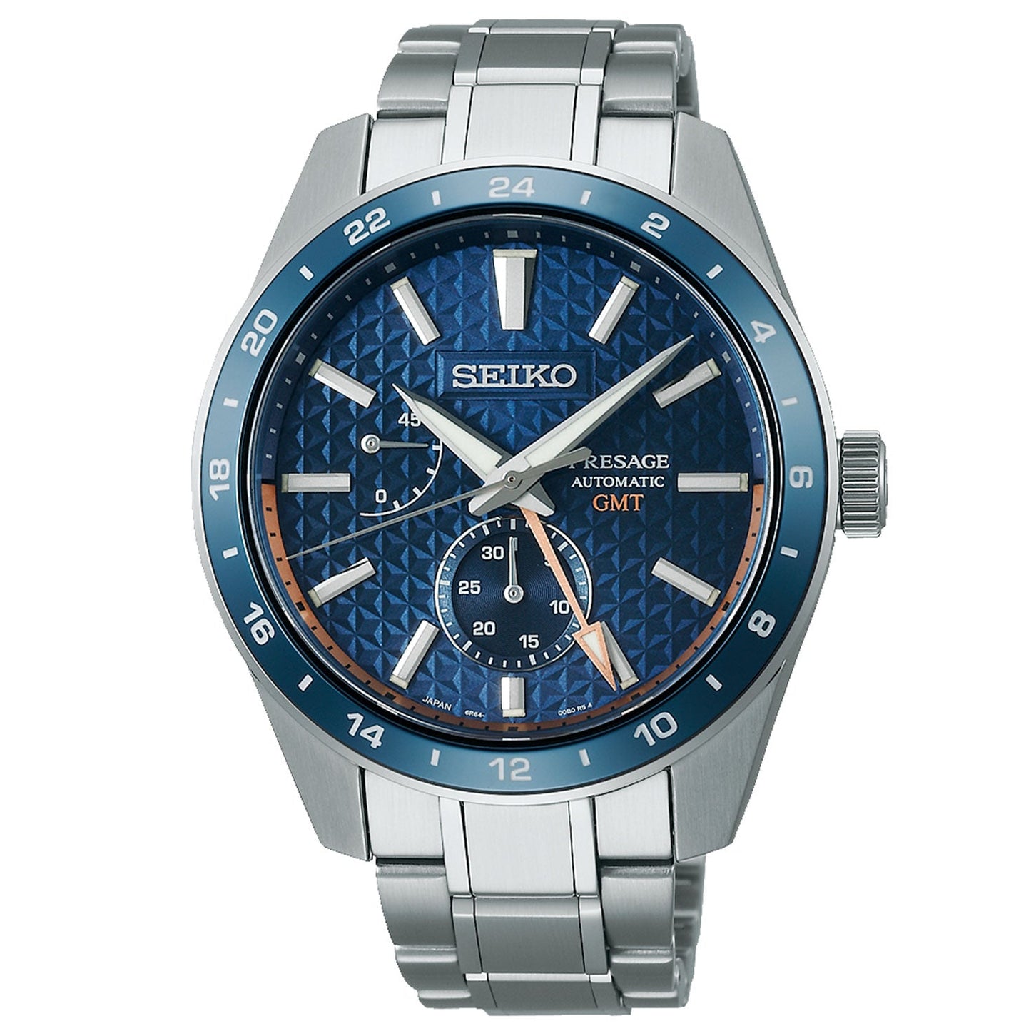The Seiko Presage Automatic With Manual Winding 42.2mm Watch, crafted by Seiko, features a stainless steel band and case. It showcases a textured blue dial adorned with silver hour markers and hands. The design is further enhanced by a GMT sub-dial, date display, and water resistance, with its elegant blue and silver bezel contributing to its sophisticated charm.