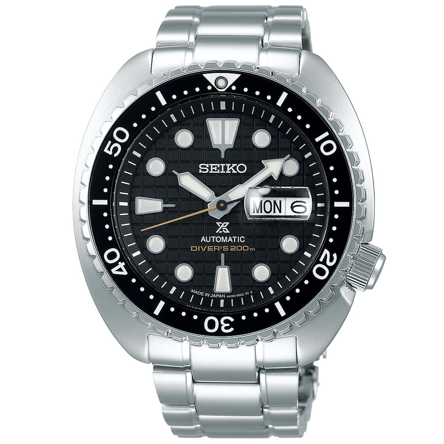 The Seiko Prospex King Turtle Automatic Watch with Manual Winding 45mm showcases cutting-edge design, equipped with a stainless steel bracelet and a black dial featuring white hour markers. It offers a day/date display conveniently positioned at 3 o'clock and includes a unidirectional rotating bezel with minute markers. This watch is water-resistant up to 200 meters.