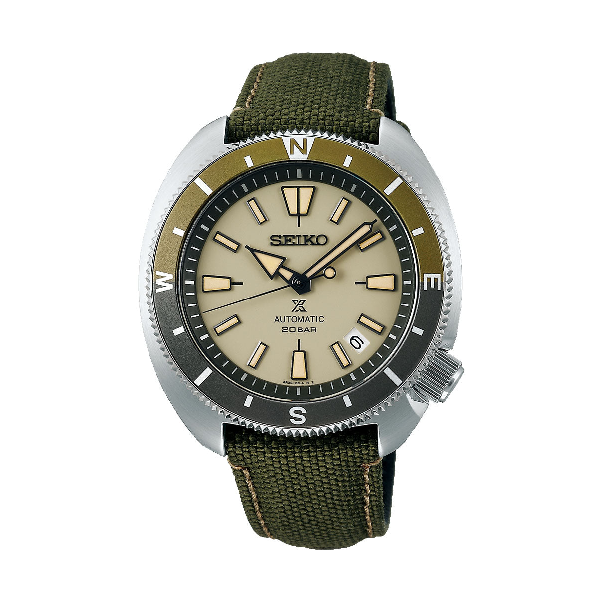 The Seiko Prospex Land Automatic with Manual Winding 42.4mm Watch features a round beige dial and a striking black and green bezel marked with compass directions. Designed as a diver's watch, it includes silver hour markers and a robust green canvas strap, with "20 BAR" prominently displayed on the dial.